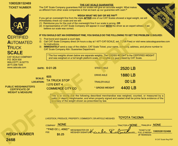 CAT Scale ticket for a 2023 Toyota Tacoma weighed June 1, 2026 at TA Truck Stop Commerce City CO. Steer axle 2520 lb, drive axle 1880 lb, gross 4400 lb.