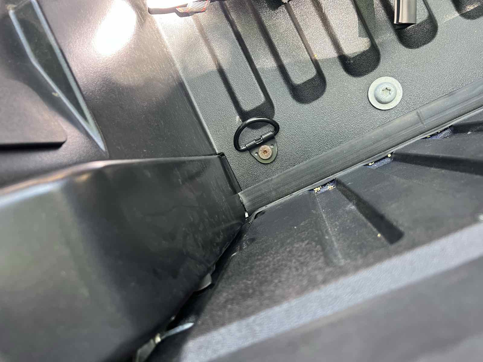 Another interior view of a closed Tacoma tailgate with only the ROK Block installed, showing the remaining gap to the underside of the truck at the corner junction.